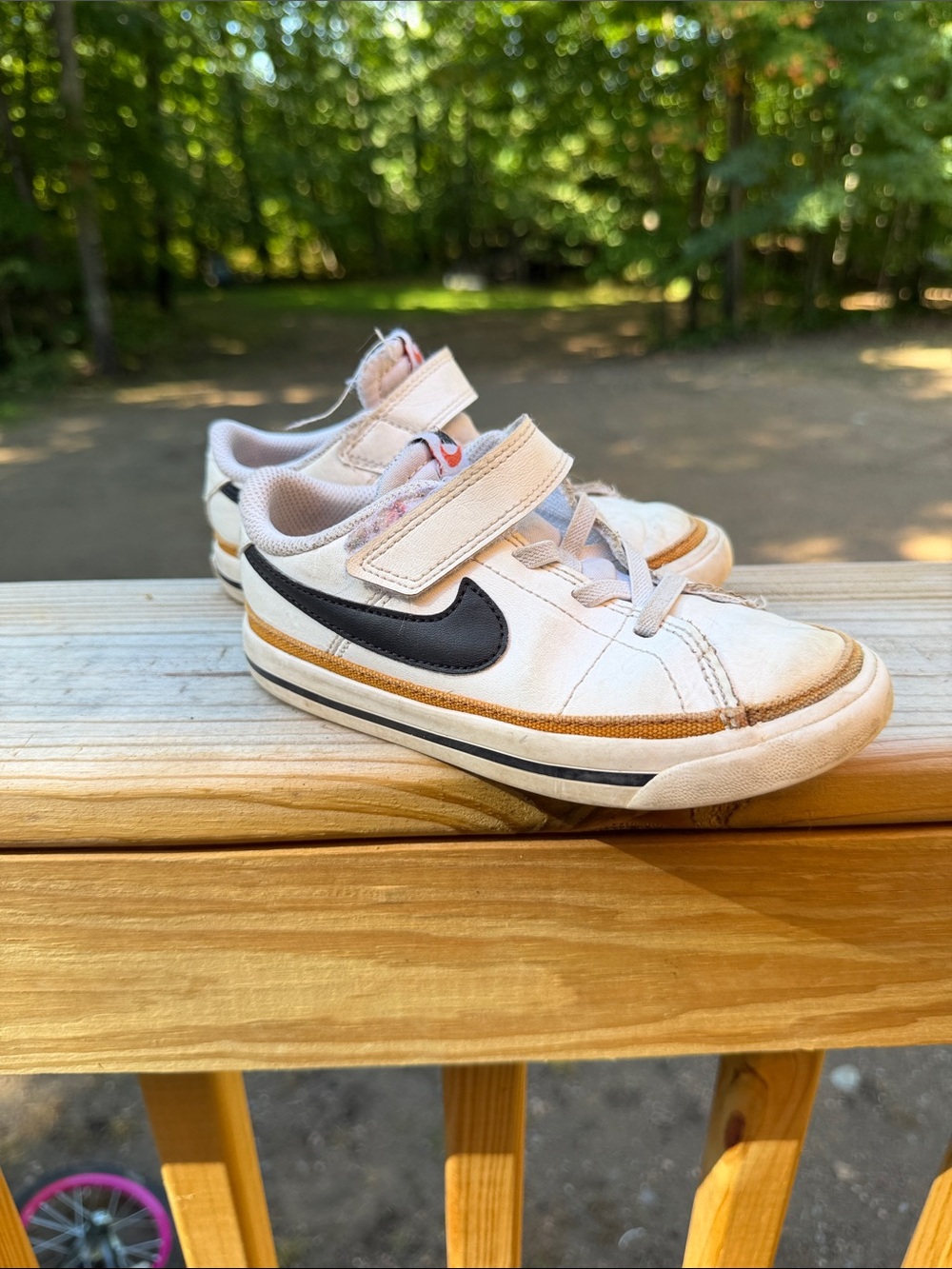 Nike Kids White Sneakers with Black Swoosh and Tan Trim